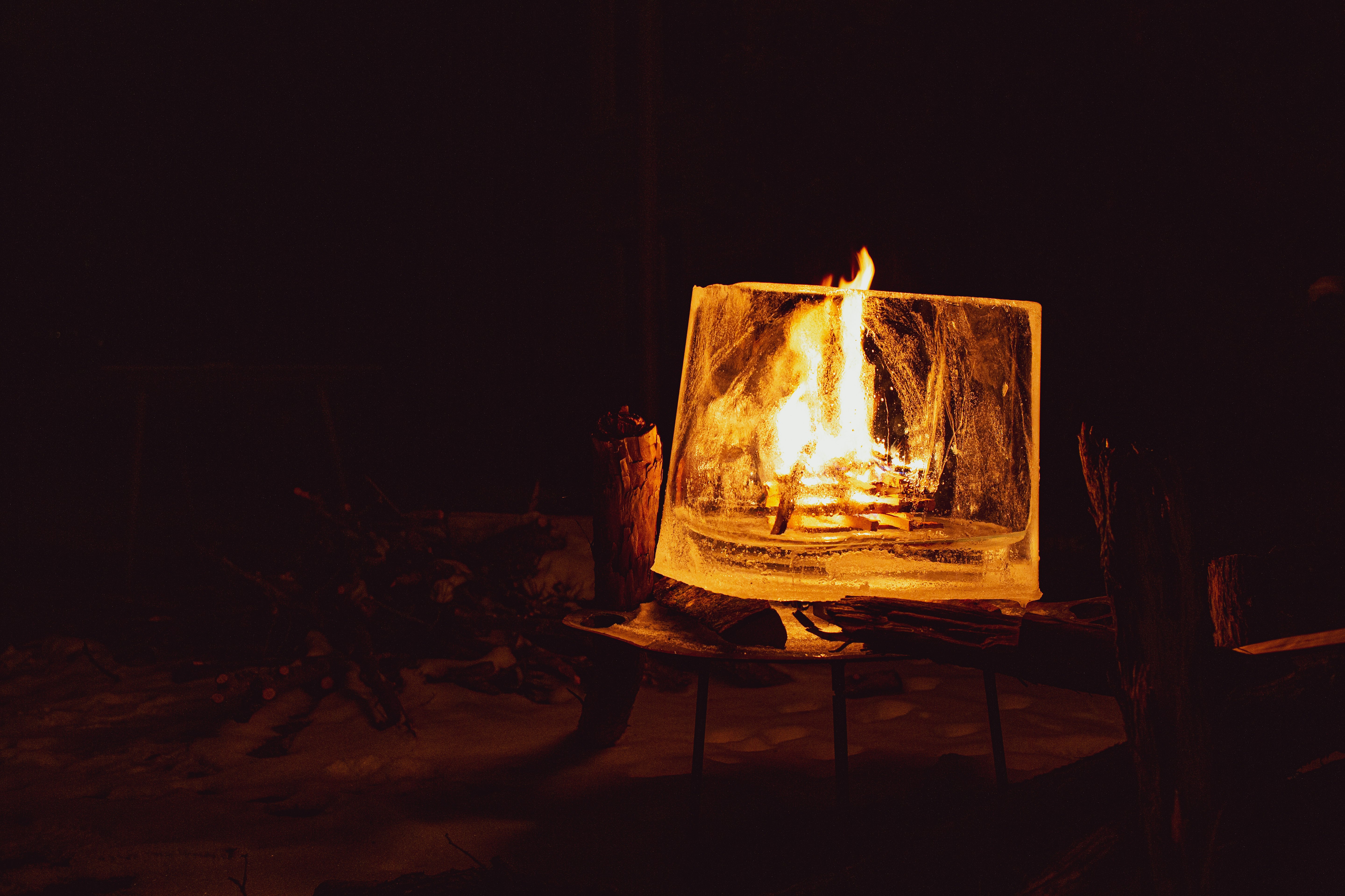 fire on brown wooden table